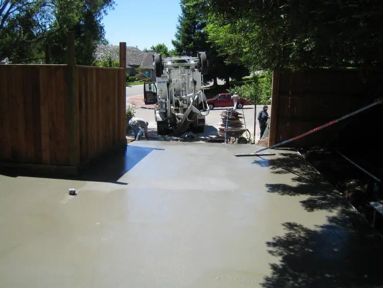 Finished concrete slab in a residential yard.